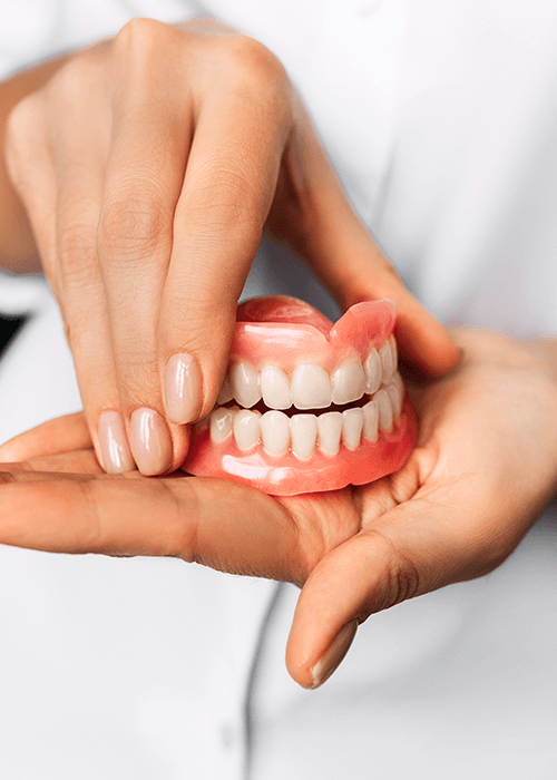 Patient at dentist during routine denture check-up